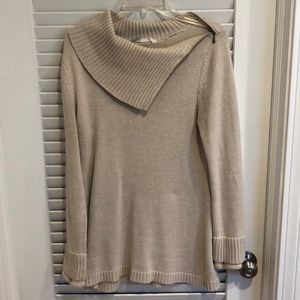 Slim fit tunic length sweater.